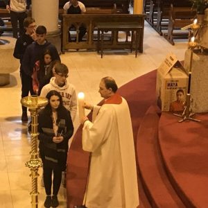 Children of Holy Family School take part in the Ceremony of Light in preparation for Confirmation 2019